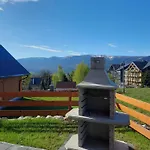 Sloneczne Chatki Chalé *